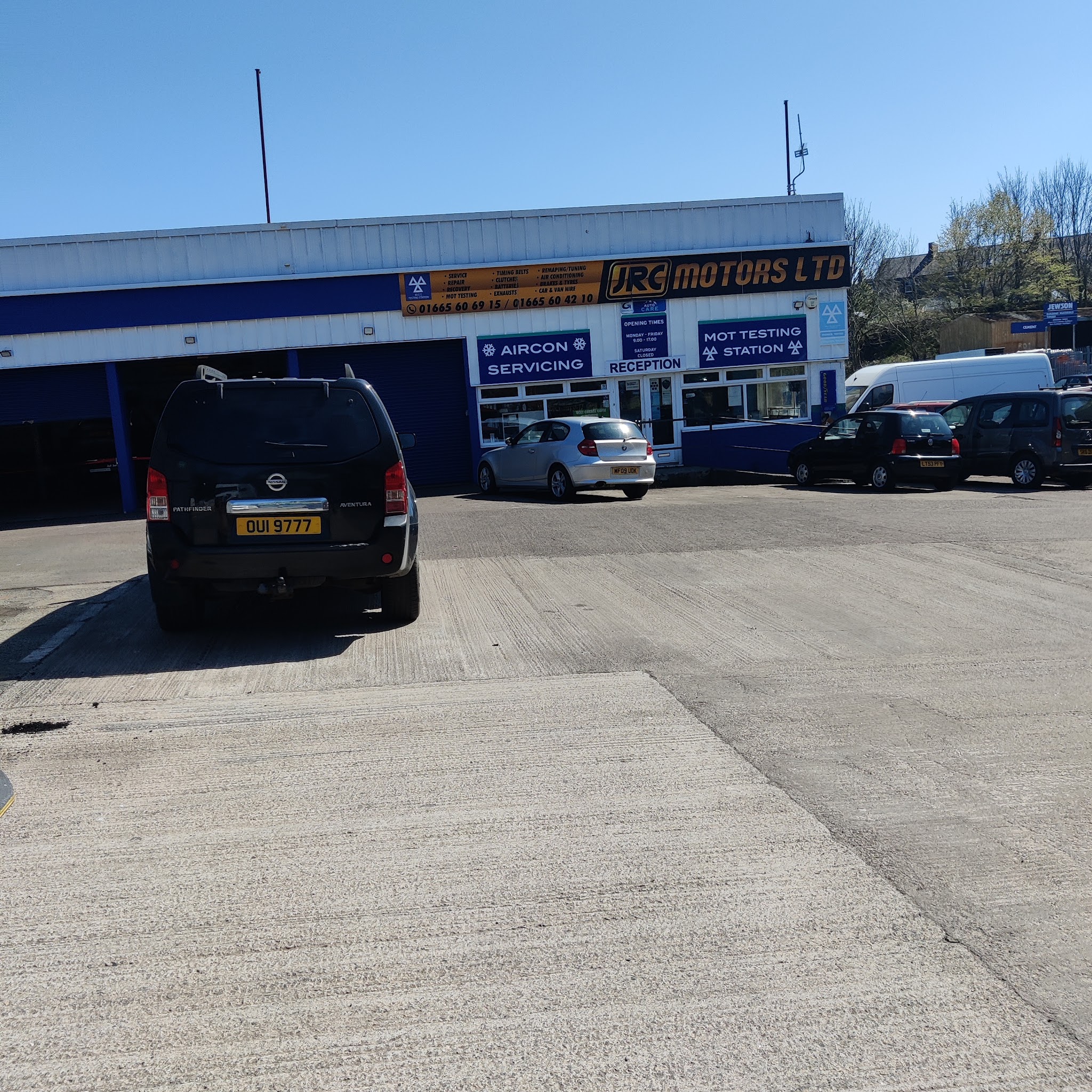 The forecourt in front of the JRC Motors Ltd building at Station Yard